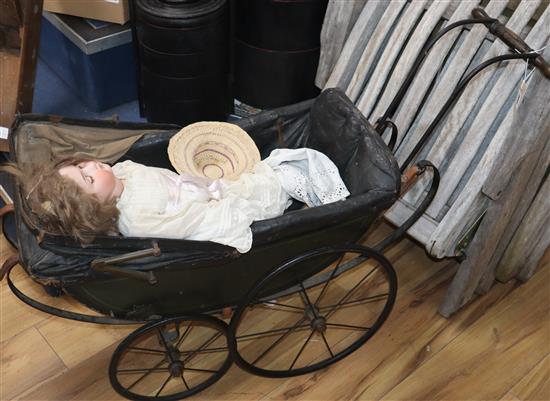 A Heubach Koppelsdorf 250-4 doll, an Armand Marseille baby doll and a pram c.1900